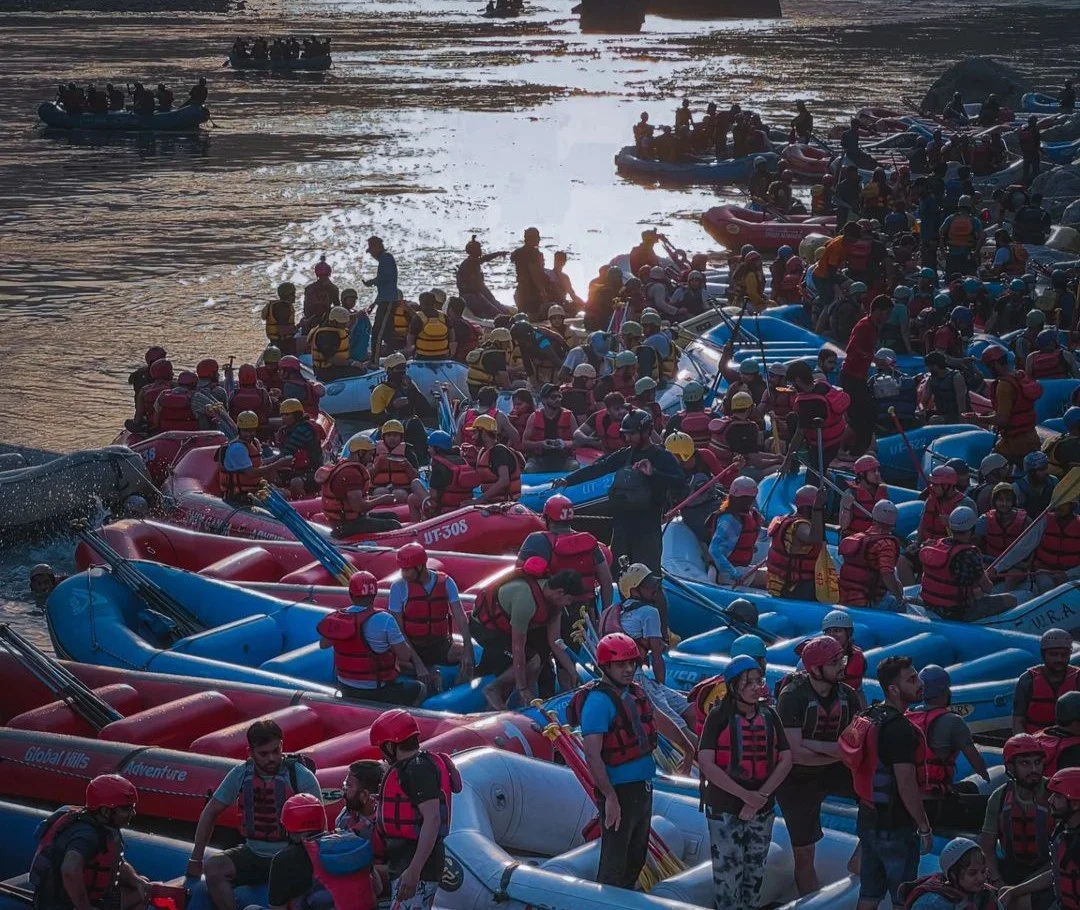 A huge crowd gathered at the shore of Ganga in Rishikesh for rafting.