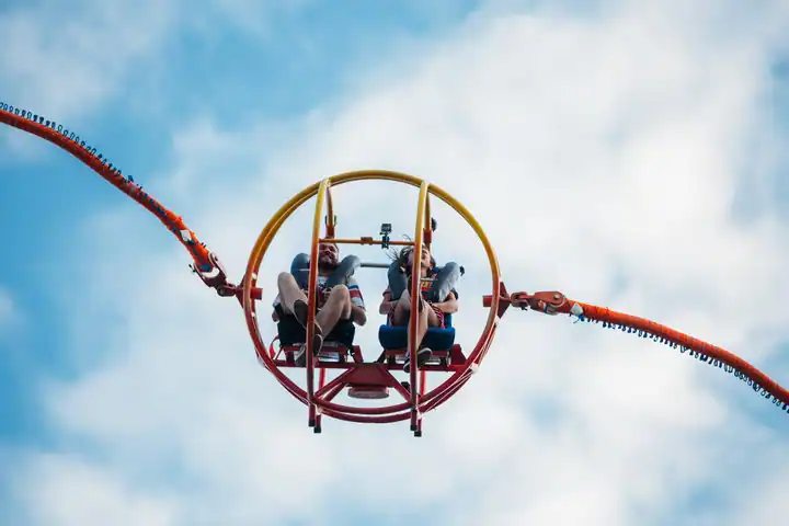 A couple trying reverse bungee jumping