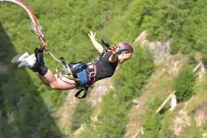 A woman bungee jumping