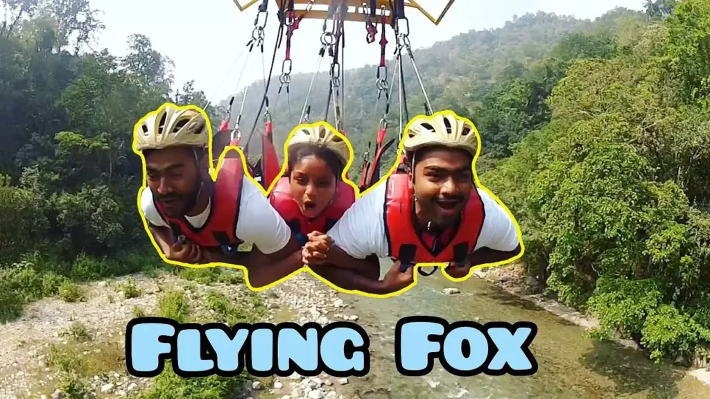 A group of three peoples trying flying fox