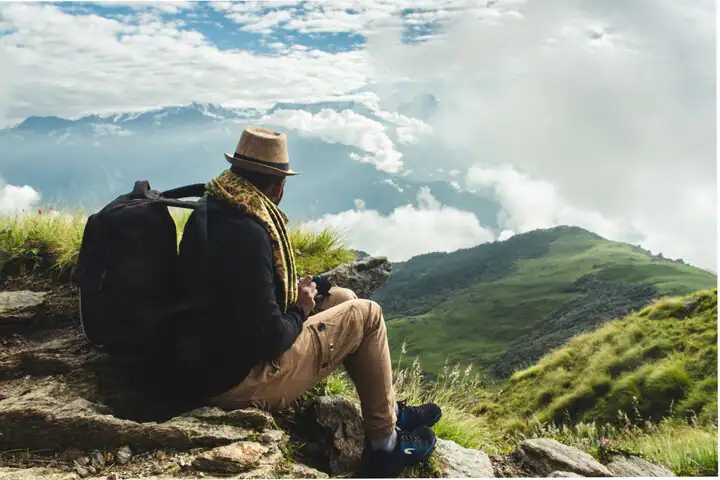 A man trekking in Uttarakhand hills