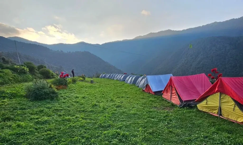 Some camps lined up on the cliff in Nag Tibba