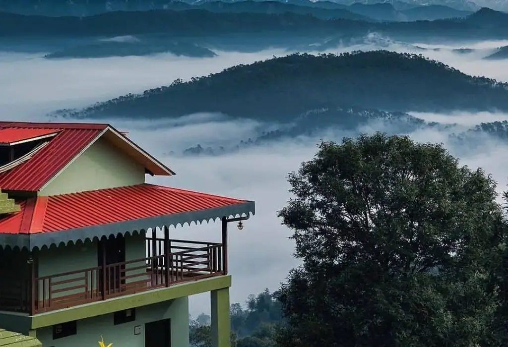 A scenic view of a resort and landscape in Kausani