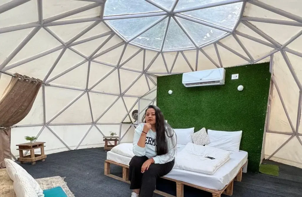 A woman sitting in a room of The Nature Vault 